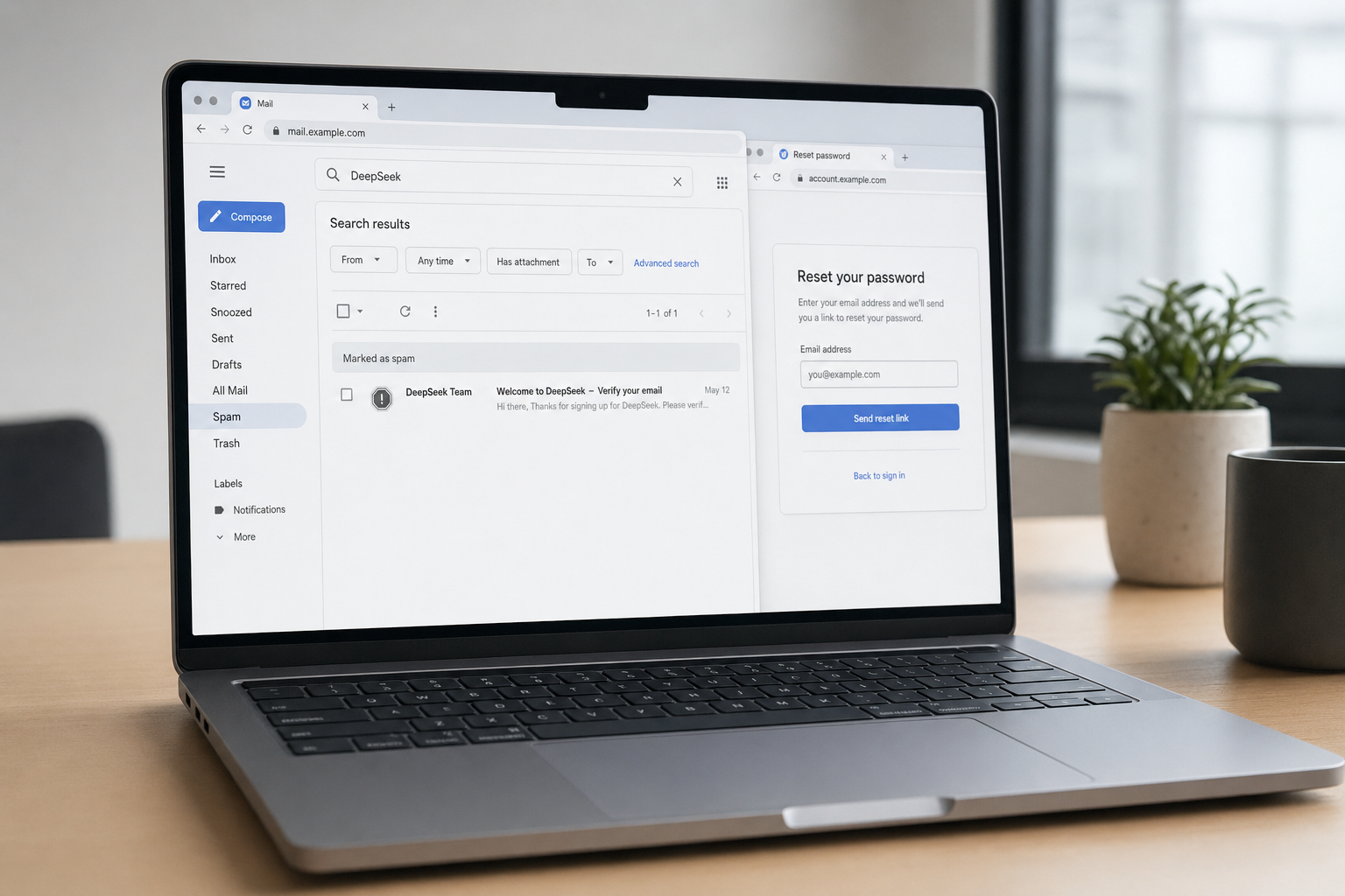 Laptop showing the spam folder with a DeepSeek password-reset email recovered after it failed to arrive